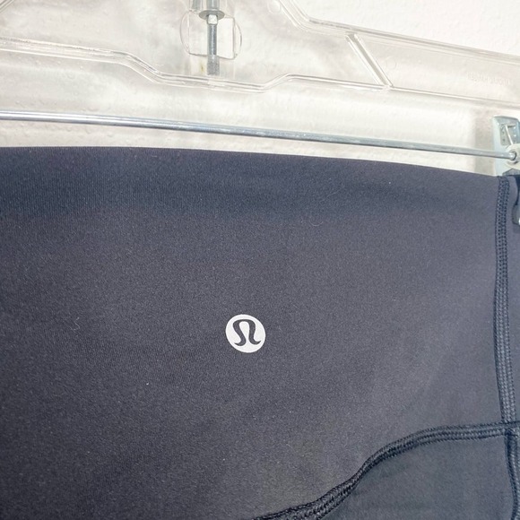 Lululemon Rise and Flow Mesh Criss Cross Leggings *Full-On Luxtreme* In Black 4 - Picture 9 of 9